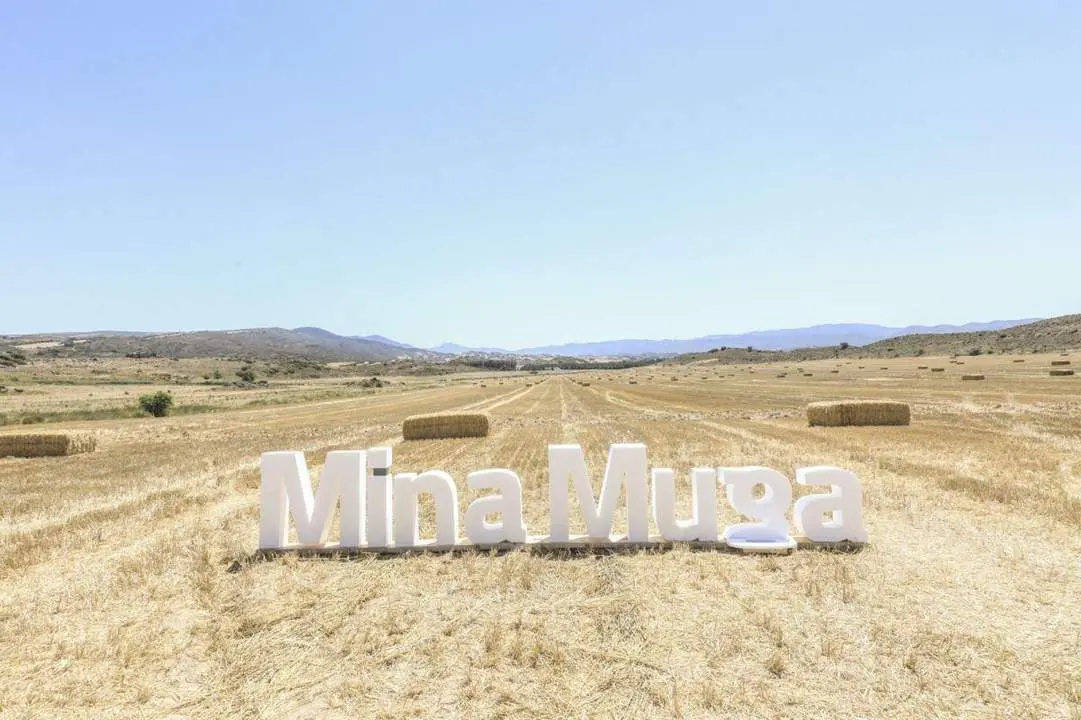 Mina Muga. - 