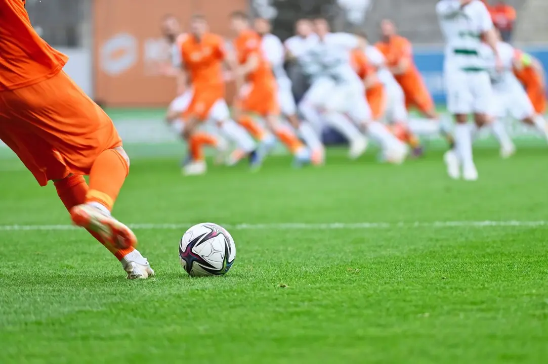 Partido de f&uacute;tbol | Foto de 123RF/dziurek